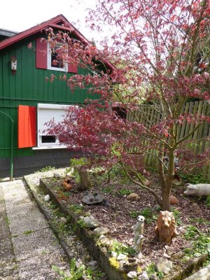 Gemütliche Erdgeschosswohnung mit großem Garten in älterem Haus