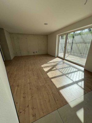 Erstbezug! Hochwertige 3-Zimmer-Erdgeschosswohnung