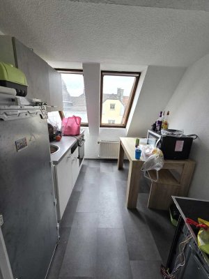 1 Zimmer Dachgeschosswohnung mit eigenem Gartenabteil