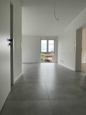 Stilvolle Eigentumswohnung 3-Zimmer-Wohnung mit Balkon, Stellplätzen und Gartenanteil