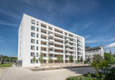 Ihr neues Zuhause mit moderner Wohnküche, lichtdurchfluteten Räumen und großzügiger Loggia