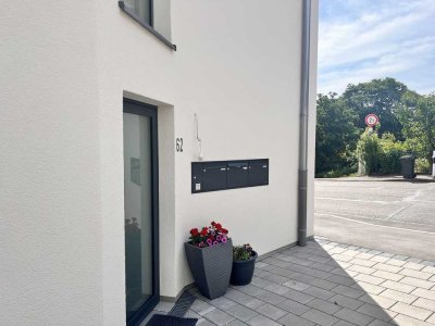 Neubauwohnung im EG mit Terrasse und Garage