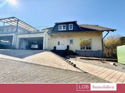 Exklusives 3-Familienhaus in Massivbauweise – Top-saniert, mit Garten, Terrassen und Waldblick / DIE