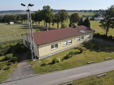 Einzigartiges Einfamilienhaus mit Gewerbefläche in traumhafter Alleinlage