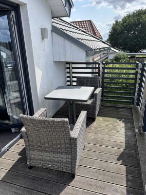 Schöne 2-Zimmer-Terrassenwohnung mit gehobener Innenausstattung mit Balkon und EBK in Rehburg-Loccum