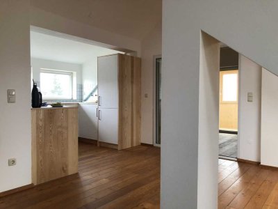 Freundliche 2-Zimmer-Dachgeschosswohnung mit Balkon und EBK in Haidmühle