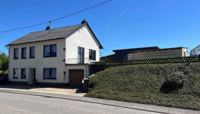 Einziehen - wohlfühlen - durchstarten Familienfreundliches Wohnhaus mit großem Grundstück