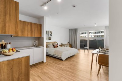 Kurzzeitmiete: Studio Extra Large (möbliert) mit Zugang zu Fitness, Co-Working, Dachterrasse, Kinoraum