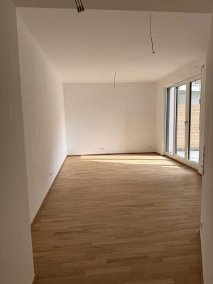 Moderne 2-Zimmer Wohnung mit Terrasse, EBK und TG Stellplatz - Erstbezug!