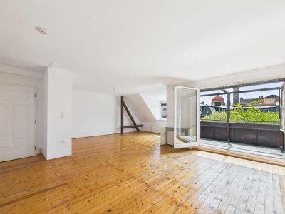 Absolute Rarität I Dachgeschossjuwel mit Terrasse & Blick auf St. Ursula in Bestlage von Schwabing