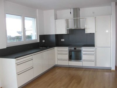 Attraktive Gartenwohnung mit großer Terrasse und eigenem Gartenanteil