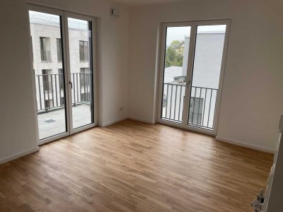 Erstbezug mit Balkon: Stilvolle 2-Raum-Penthouse-Wohnung mit geh. Innenausstattung