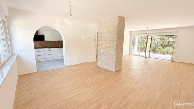 Privates Wohngefühl auf höchstem Niveau – Gartenwohnung mit allem, was das Herz begehrt | ZELLMANN IMMOBILIEN