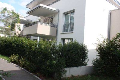 Neuwertige 4-Zimmer-Erdgeschosswohnung aus 2021 mit EBK, Terrasse, Garten, 2x TG