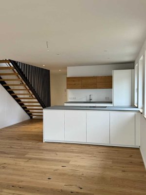 Familientraum Modernes Wohnen auf zwei Etagen - Maisonette im Stil eines Stadthauses
