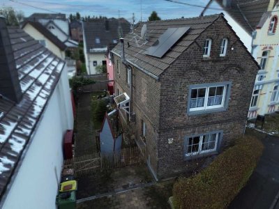 Solides, gemütliches EFH mit Kamin und 4 Schlafzimmern im Zentrum von Mondorf