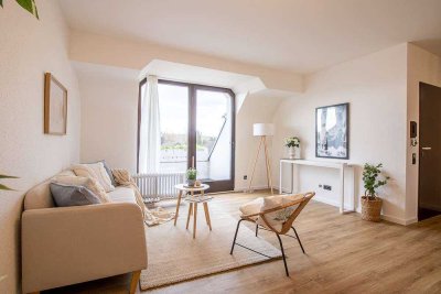 Modernisierte 3-Zimmer-Wohnung – Balkon, Einbauküche und Garage inklusive