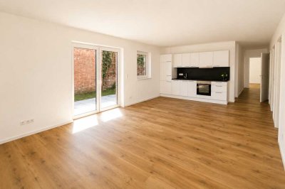 4-Zimmer Wohnung mit Garten, überdachtem Stellplatz und Einbauküche!