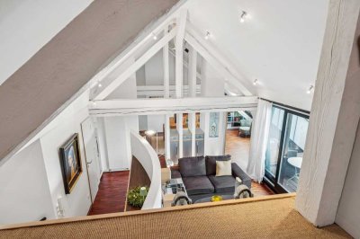Dachgeschossjuwel mit Loftcharakter, sonniger Terrasse und diskreter Privatsphäre