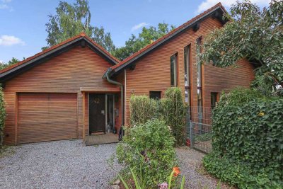Einzigartiges Designhaus mit besonderer Verbindung zur Natur - eine Oase auf 1000qm Grund.