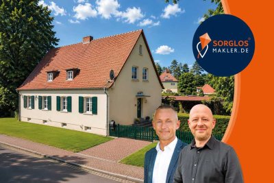 Besondere Doppelhaushälfte mit historischem Flair und traumhaftem Garten