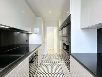 Hochwertig sanierte 3-Zimmer-Wohnung mit exklusiver Einbauküche und Südbalkon