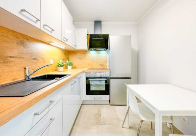 Sonnige 2-RW* 1. OG* frisch saniert* EBK* moderne Möblierung* TG-SP* Süd-Balkon & Terrasse* Aufzug*