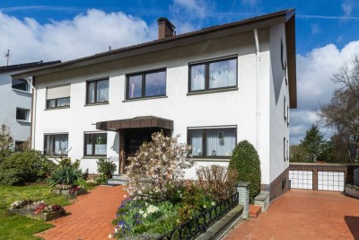 Hochwertiges Mehrfamilienhaus mit Traumgarten