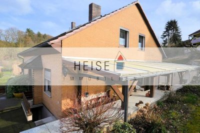 1- bis 2-Familienwohnhaus mit Garage und überdachtem Freisitz