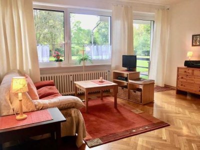 Helle 2-Zimmer-Wohnung mit großem Gemeinschaftsgarten und Sauna