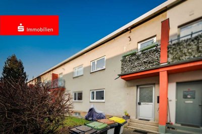 Frankfurt-Praunheim: Charmantes Ernst-May-Reihenhaus mit eigenem Garten und modernisiertem Innenbere