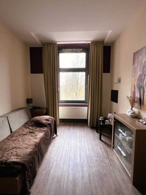 Wertanlage ERBA-Insel: vermietete, hell möblierte Studentenwohnung mit Blick ins Grüne