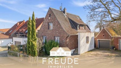 Freistehendes Einfamilienhaus mit 2 Garagen in attraktiver Lage, ideal für Familien