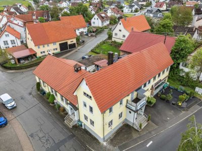 Großzügige Gewerbeimmobilie mit vielseitiger Nutzung – inklusive zwei Wohneinheiten in Grosselfingen