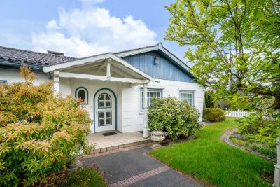 Charmanter Bungalow mit viel Potential und großem Gartenparadies: Wohnen im grünen Ellerbek