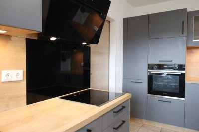 2-Zi.-EG-Wohnung mit EBK, Garage, Keller, Terrasse u. Kamin in Oberlemp