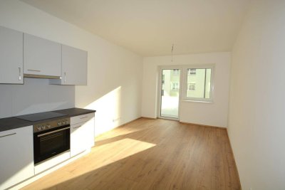 Neuwertige 2-Zimmer Wohnung mit moderner Einbauküche und Balkon in aufstrebendem Wohnviertel!