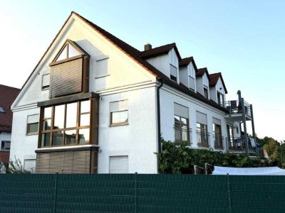 Helle Obergeschosswohnung in 9-Familienhaus