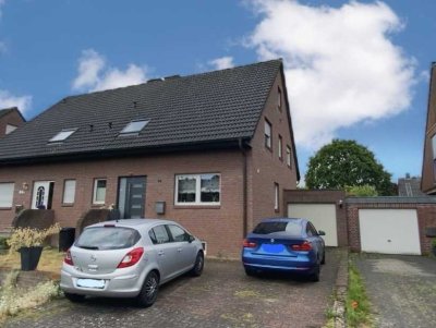 Charmante Doppelhaushälfte mit Garten und Garage in ruhiger Lage