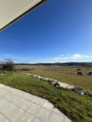 Exklusive 3,5 Zimmer Wohnung mit traumhaftem Ausblick und Garten