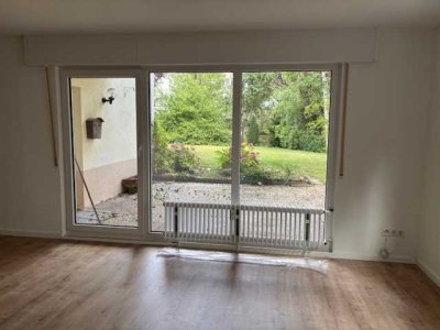 Schöne und renovierte 3 Zimmerwohnung mit großem Garten