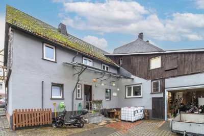 Viele Möglichkeiten: Einfamilienhaus mit Garten und Scheune in Steinbrücken
