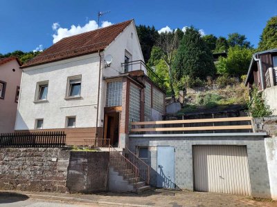Kleines, freistehendes Wohnhaus mit Garage (provisionsfrei für Käufer)
