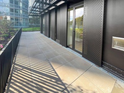 Erstbezug in den DC Flats: 1,5-Zimmer Erdgeschoßwohnung mit Terrasse – zu mieten in 1220 Wien