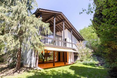 Stilvolle Doppelhaushälfte: Moderne Architektur trifft auf naturnahes Wohnen