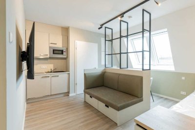 Möbliertes Dachgeschoss-Apartment mit Kochnische