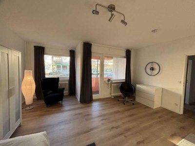 Stilvoll renovierte, möblierte 1-Zimmer-Wohnung mit Balkon und moderner Einbauküche – befristet