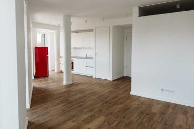Helle Neubau 1-Zi. Whg - Erstbezug mit moderner EBK und Ausblick auf Hamburgs Skyline