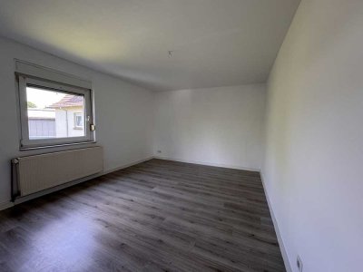 Charmante Wohnung mit großer Wohnküche und Gemeinschaftsgarten!