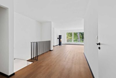 Modernes Wohnen am Alsterlauf – sanierte Maisonettewohnung mit Garten und eigener Anlegestelle